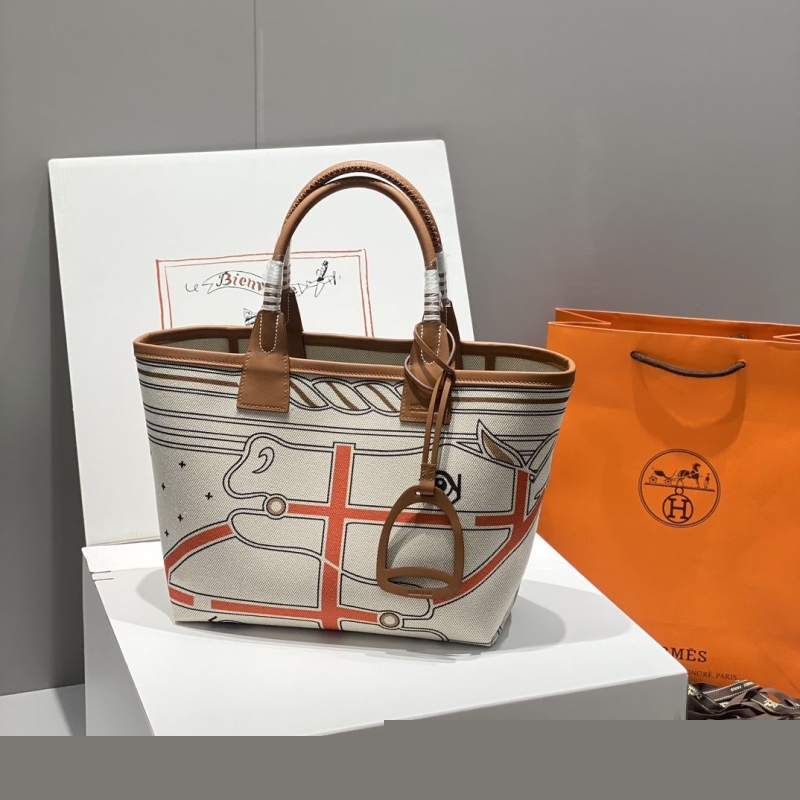 H**mes shopping bags